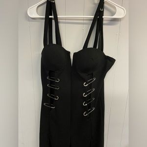 Black jumpsuit with paper clip design